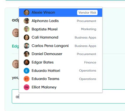 The mention list that opens when you type @ in a comment, showing people and their departments